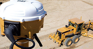 Cat Accugrade with equipment in background