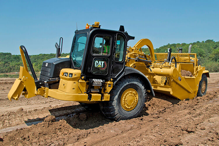 Cat 627 Scraper with Grade Control on Jobsite
