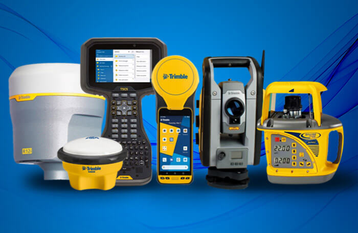 Trimble & Spectra Equipment on Blue Background